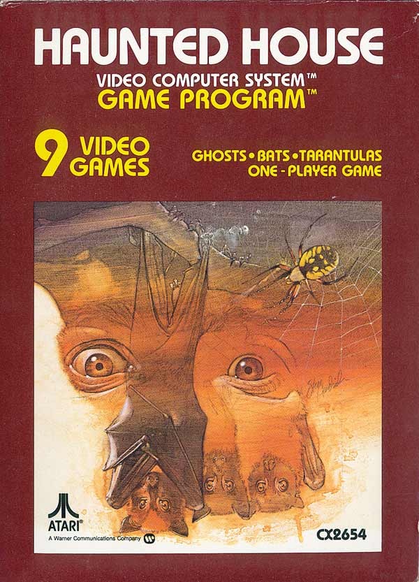 Cover art for Haunted House on the Atari 2600, showing glowing eyes in the dark, a bat, and a tarantula in its web.
